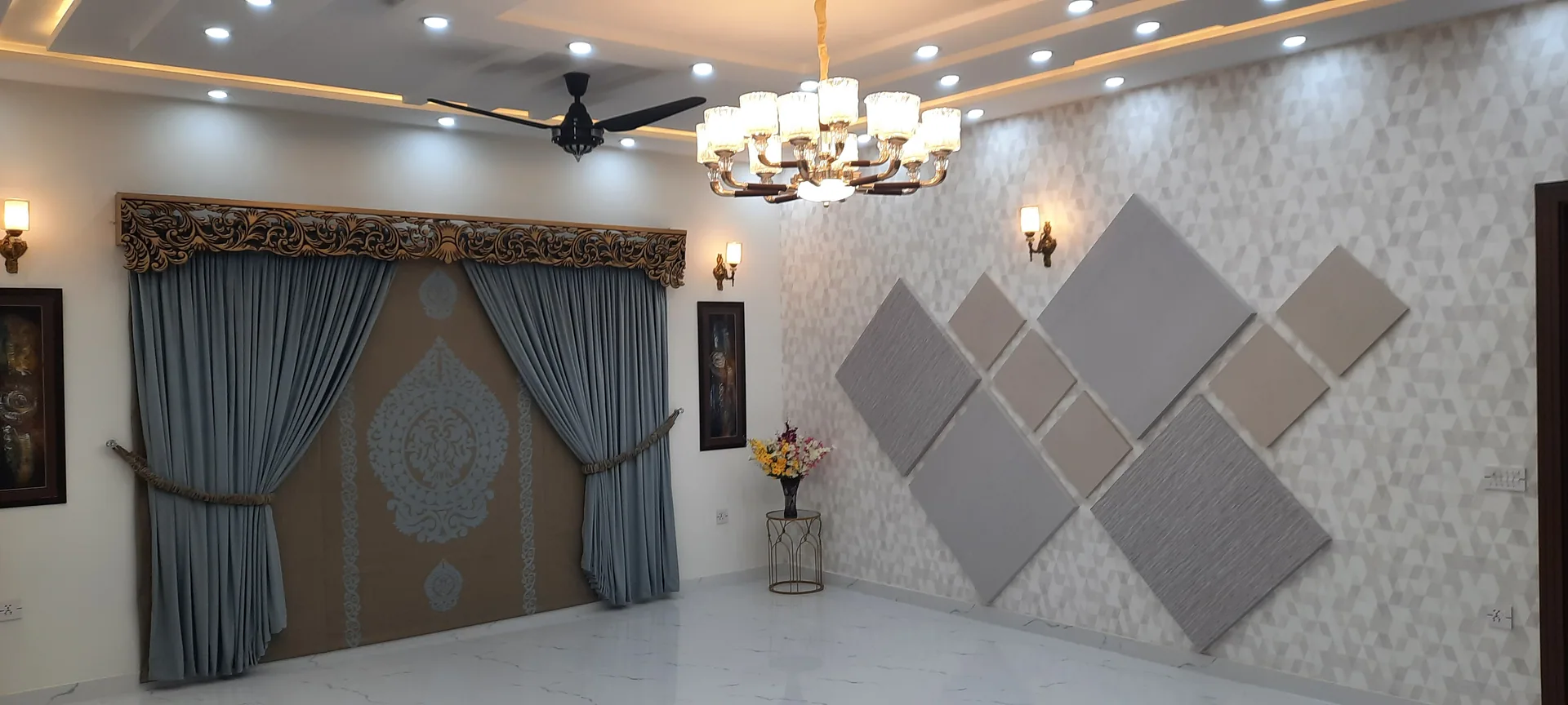 11 Indus — bedroom chandelier wall, DC Colony Gujranwala