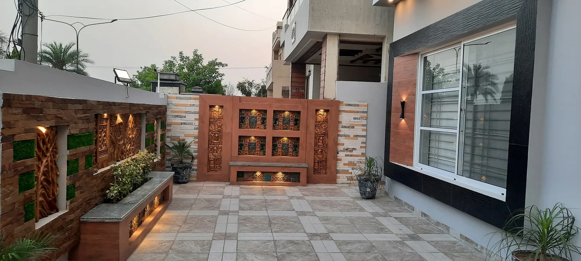 11 Indus — tiled front courtyard, DC Colony Gujranwala