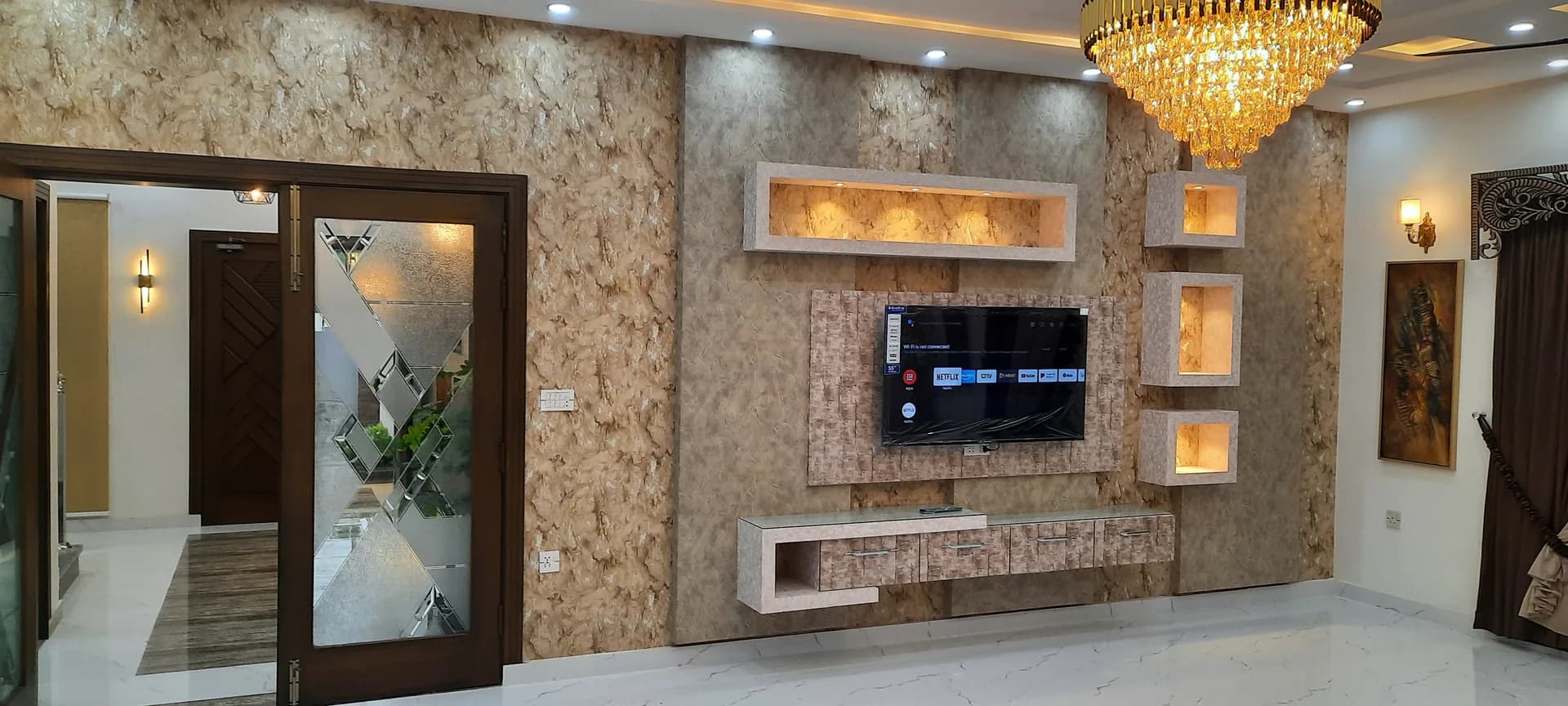 11 Indus — TV lounge media wall, DC Colony Gujranwala