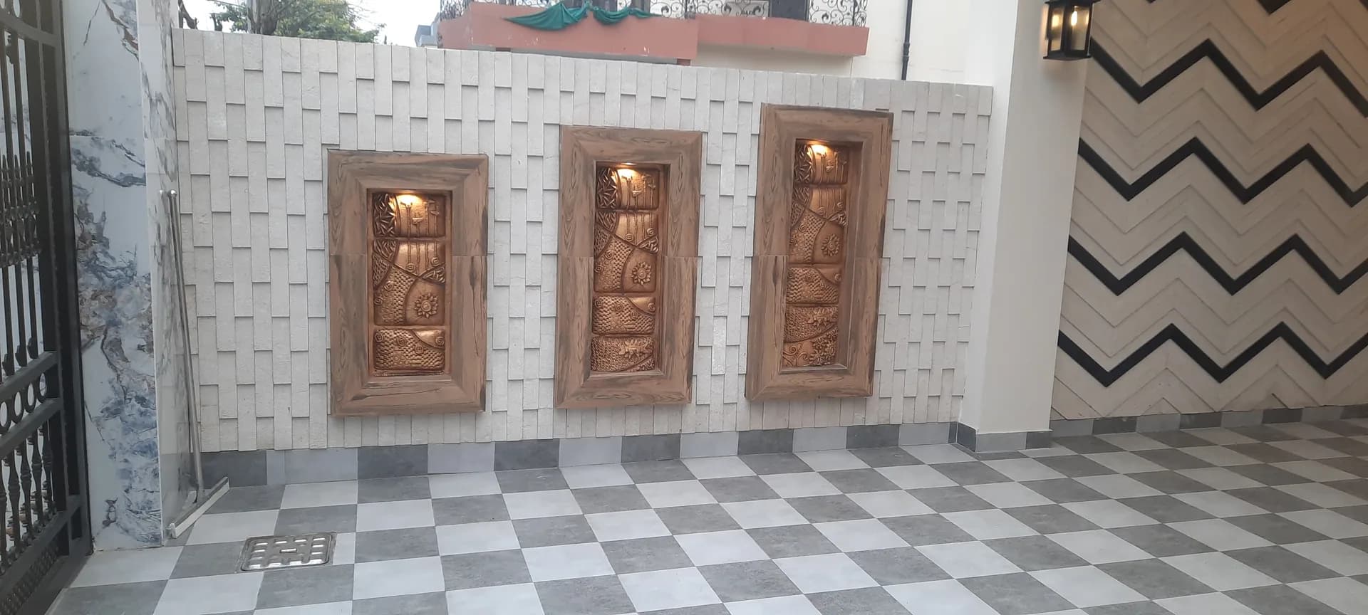 36 Jehlum — courtyard feature wall, DC Colony Gujranwala