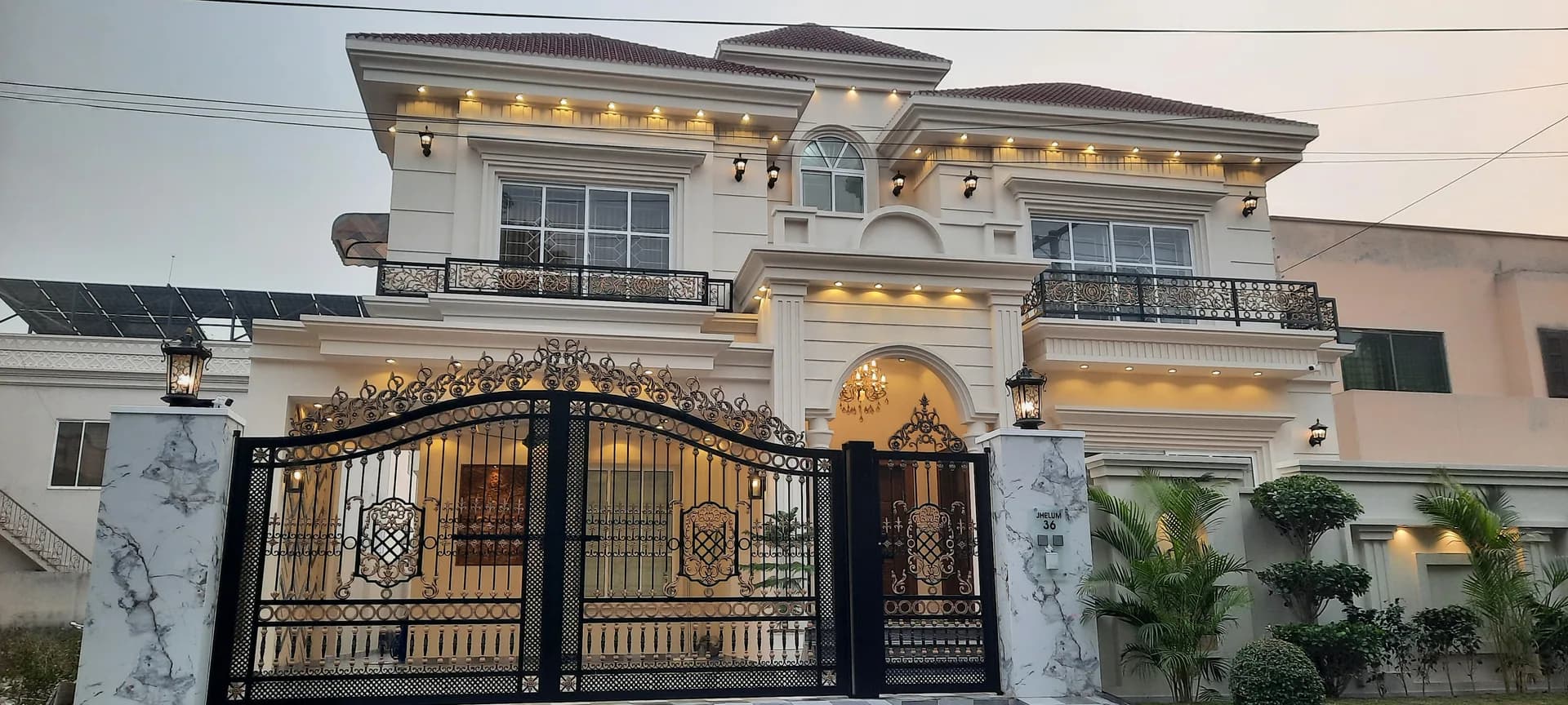 36 Jehlum — gated front elevation, DC Colony Gujranwala