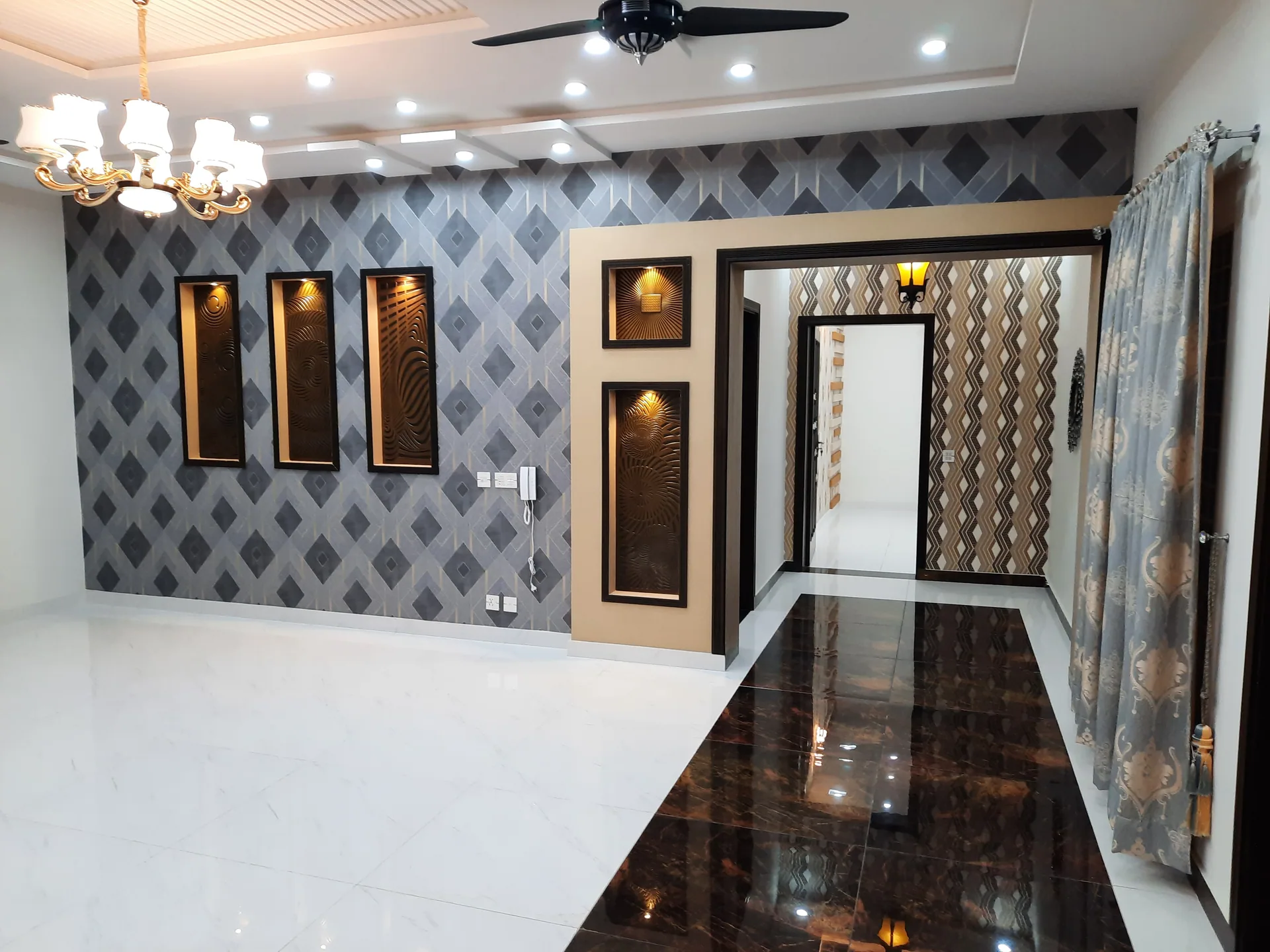 67 Jehlum — formal living room, DC Colony Gujranwala