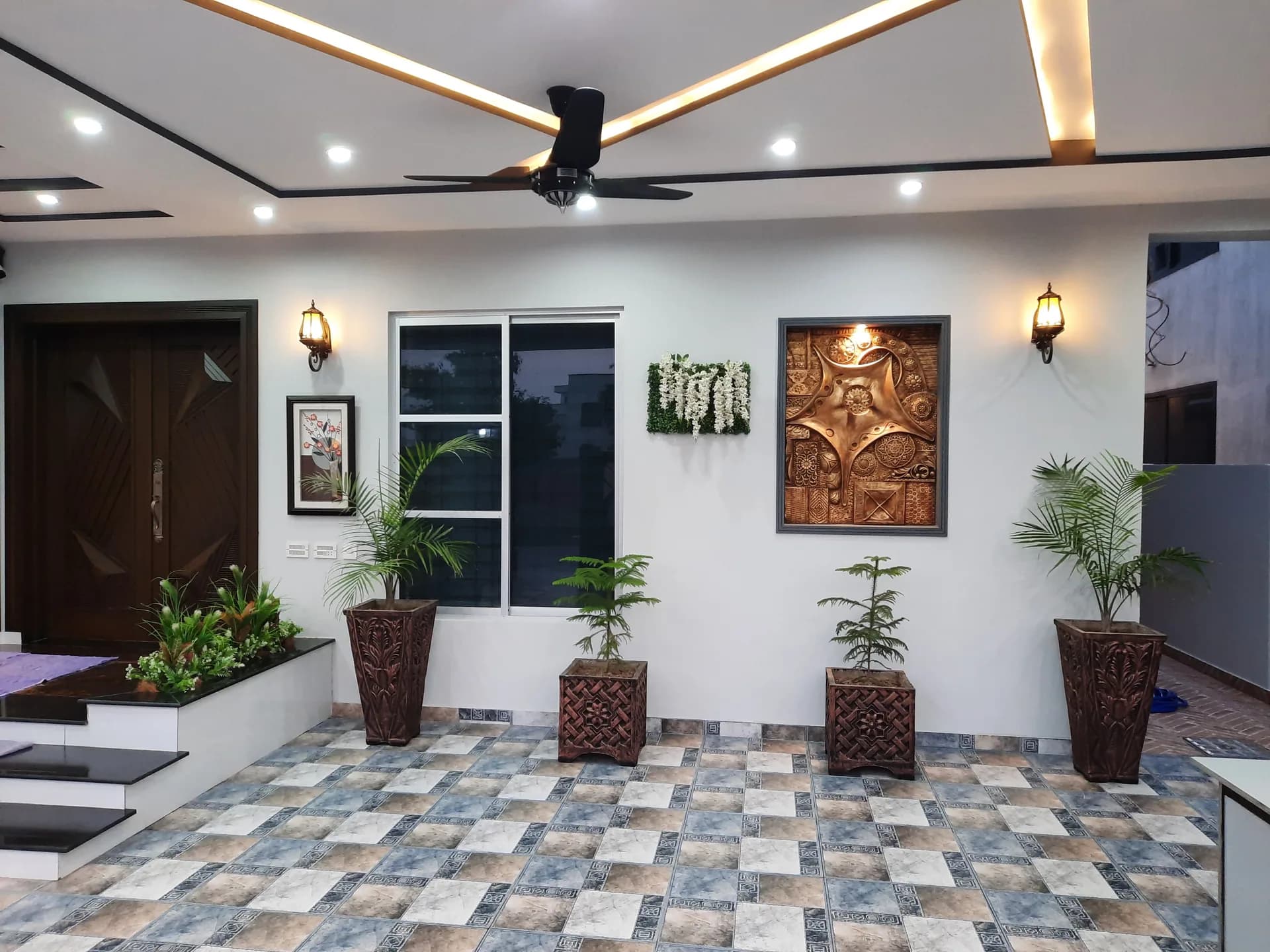 67 Jehlum — front porch entrance, DC Colony Gujranwala