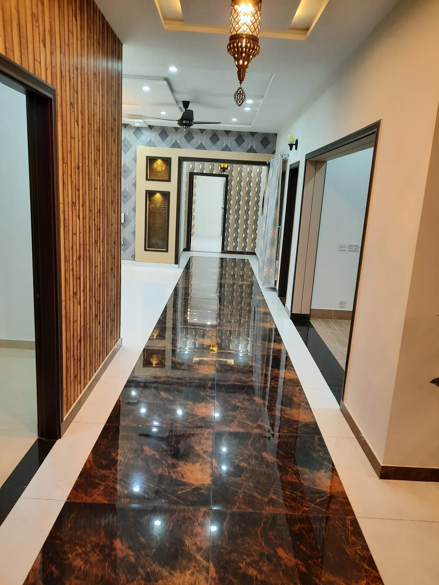 67 Jehlum — marble interior hallway, DC Colony Gujranwala