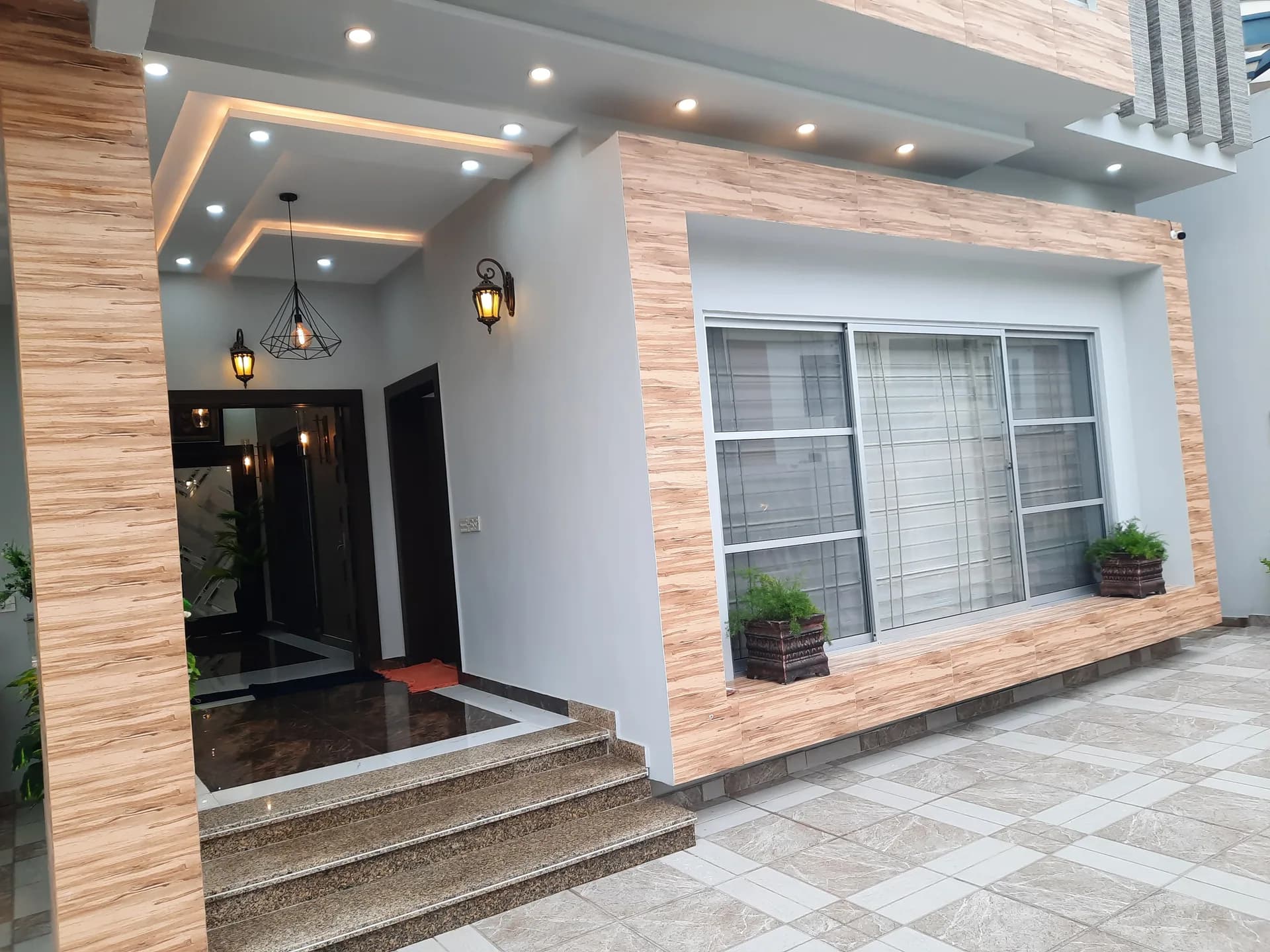 82 Jehlum — front door porch, DC Colony Gujranwala