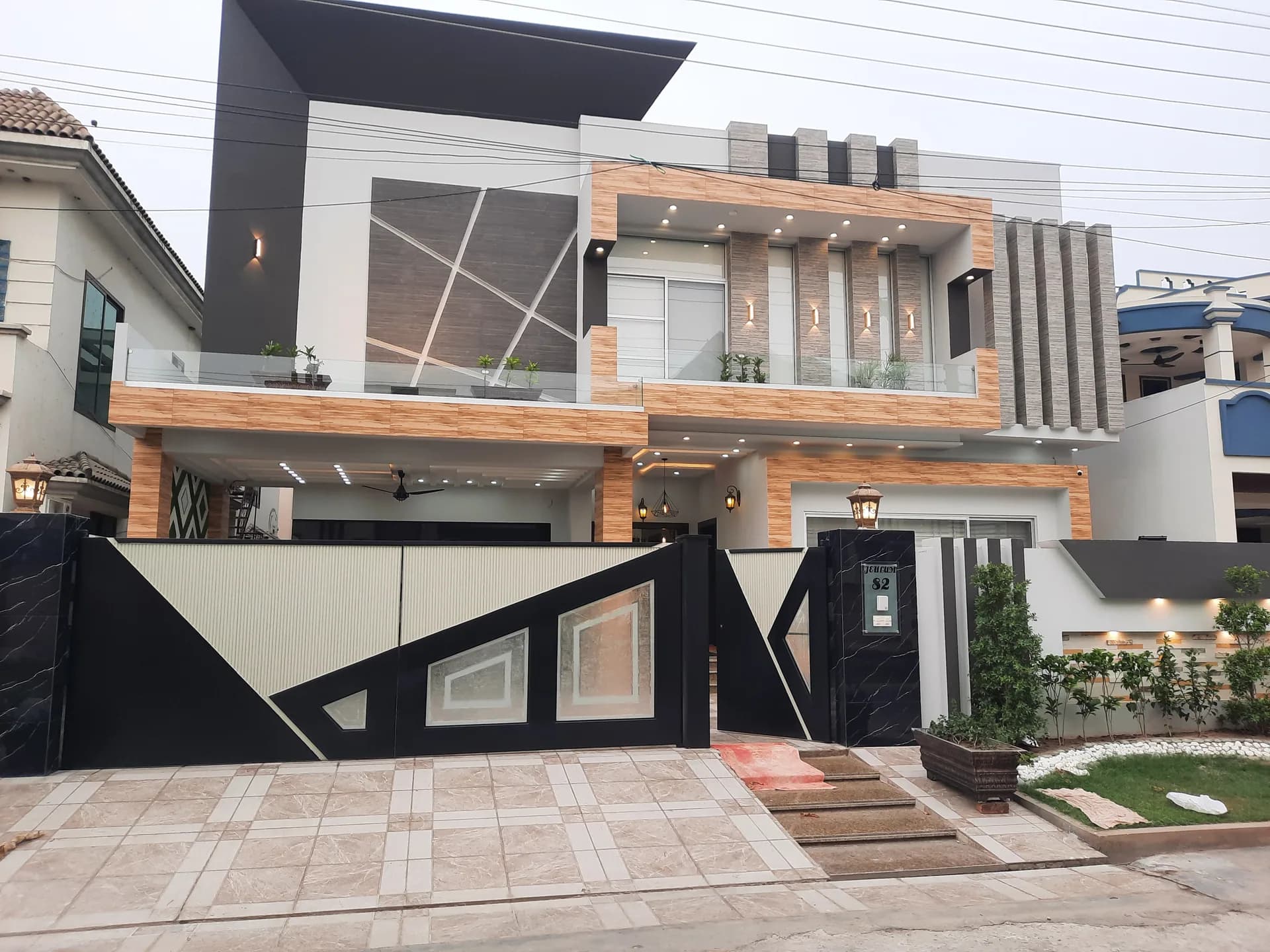 82 Jehlum — modern house facade, DC Colony Gujranwala