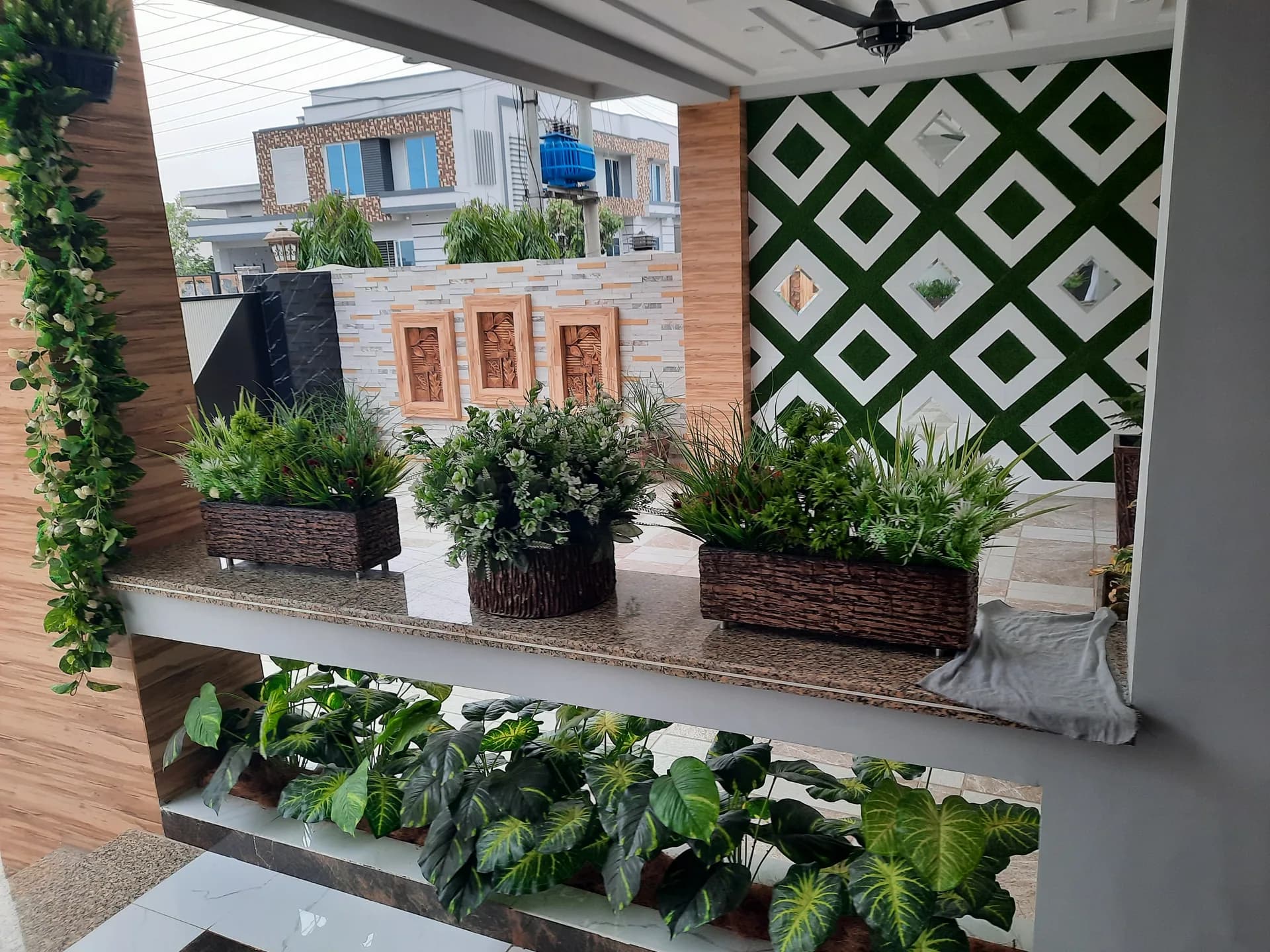 82 Jehlum — porch planter detail, DC Colony Gujranwala